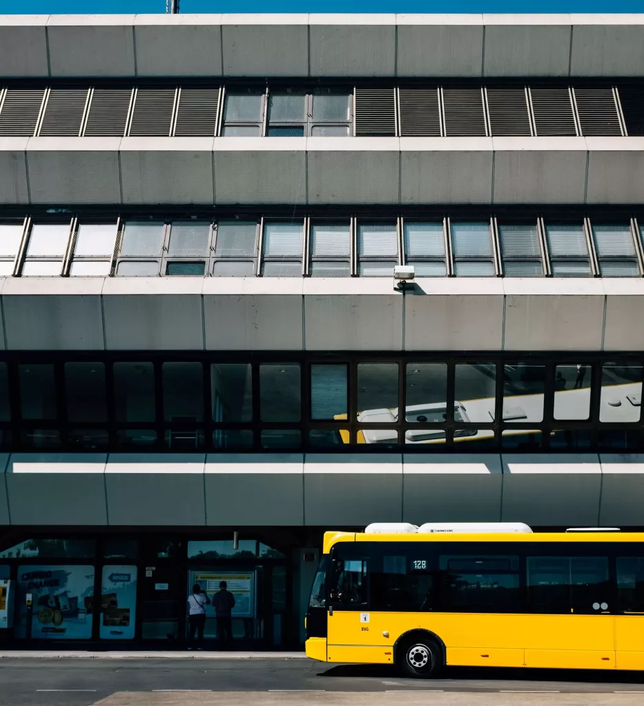 yellow saloon bus